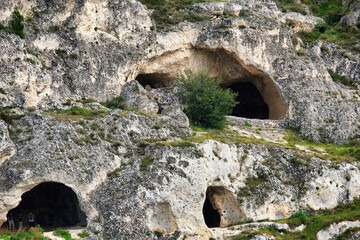 Prehistoric caves in the Murgia Materana reserve (Matera Italy) dating back to the Paleolithic and...