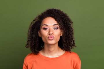 Fototapeta premium Photo portrait of lovely young lady kiss pouted lips girlfriend wear trendy orange outfit isolated on khaki color background