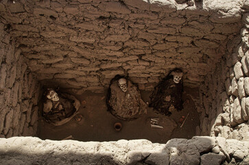 The Chauchilla Cemetery near Nazca (Peru) with its dozens of tombs, where you can observe the...