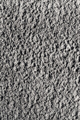 vertical background in the form of gray plaster.