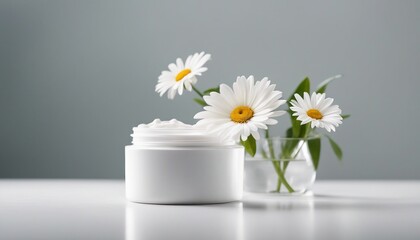 empty cosmetic cream container and daisy flower plant decor in white color, isolated white color

