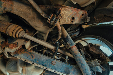 Car suspension detailed view, rusty details