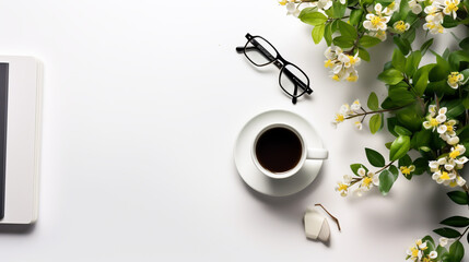 Empty notepad with coffee cup on white table,  Minimal style feminine workspace. Modern office desk with computer keyboard, coffee cup, glasses, notebook, envelope, blank paper card on white backgroun