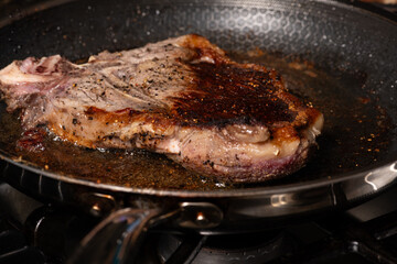 Cooking Beef Steak in Frying Pan