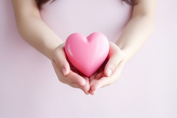 Pink Heart in Hands