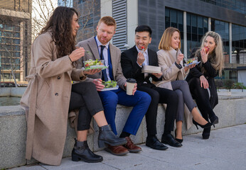 Fototapeta premium office people at lunch time with salads and healthy fruit