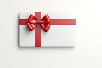 Sleek Gift Box with Red Ribbon on White. A classic white gift box tied with a red bow on a minimalist white background.