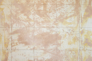 Grunge background of an Old vinyl tiles with remnants of adhesive