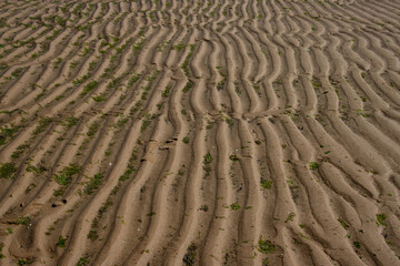 Natural sand pattern at a beach for background