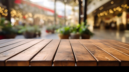 Wooden table blurred background of restaurant,  image of wooden table in front of abstract blurred background of resturant lights Empty tabletop in the coffe shop