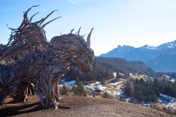 Wooden sculpture of a dragon. Italian landmark