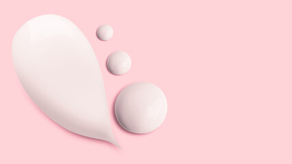 Smears of white cream on pink background