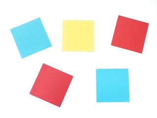 Five square multi color empty memo notes on a white background