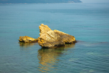 Big stones in the sea near the shore, interesting for geologists