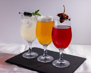 set of colorful cocktails against white background