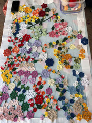 Partially finished fancy Handmade Tablecloth with floral pattern