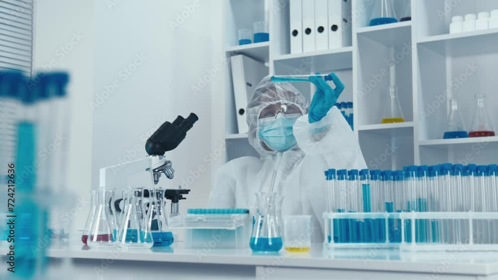 Poster in the lab, scientists delve deep into the analysis of medical samples, using cutting-edge technolog