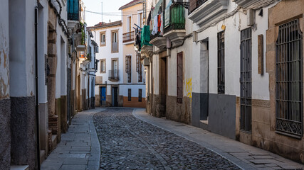 Narrow picturesque street in the medieval town of Caceres in Extremadura.