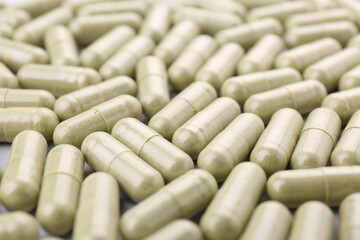 Many vitamin capsules as background, closeup view