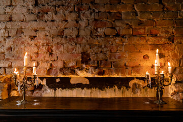 Elegant Candlelight Against Rustic Brick Wall