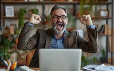 person working on laptop get exited by good news