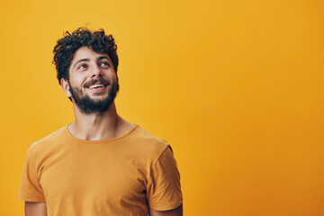 Man person studio guy young happy face confident portrait positive adult background look yellow expression - obrazy, fototapety, plakaty