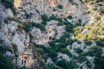 Archeological remains of the Lycian rock cut tombs in Myra, Demre, Turkey.
