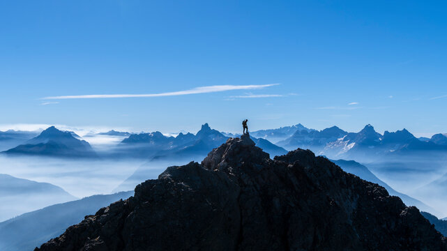 Hiker on the summit of Lady Peak Summit, Chilliwack BC