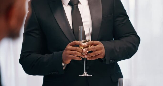 Champagne, speech and hands of person with glass to toast for special event, congratulations or New Year. Chat, classy or closeup of formal speaker talking with alcohol, drink or sparkling white wine