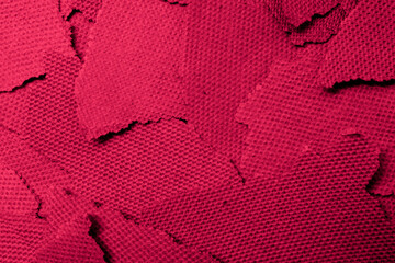 red pieces of torn sheets of paper, background
