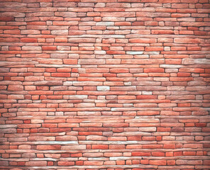 Grunge background with the texture of old brick wall. Antique masonry with bricks of different sizes and colors creates an original texture.