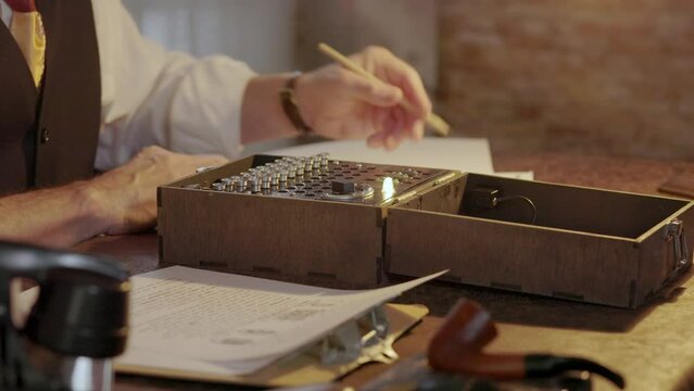 WWII scientist working on breaking the Enigma machine code