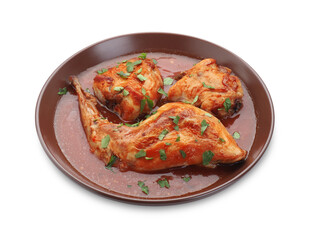 Tasty cooked rabbit meat with sauce and parsley isolated on white