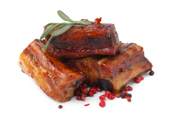 Tasty roasted pork ribs, rosemary and peppercorns isolated on white