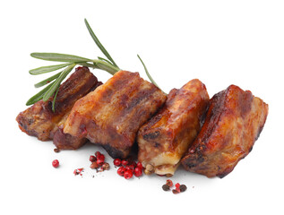 Tasty roasted pork ribs, rosemary and peppercorns isolated on white