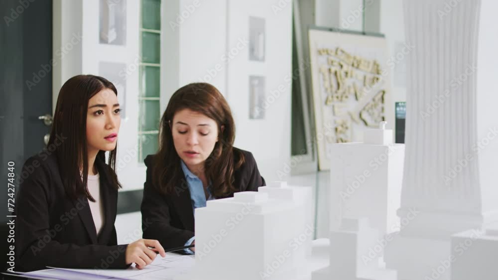 Aufkleber architectural agency workers taking notes on blueprints, calculating real scale measurements to ensu