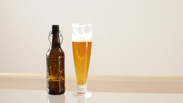 Glass of beer , Jugs, mugs, pints of brew beverage, ale, cider on table. craft beer bottles 