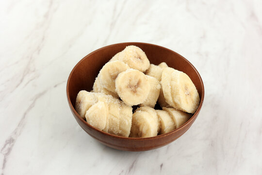 Frozen Sliced Banana on Bowl, Ingredient for Smoothies, Ice Cream, Desserts.