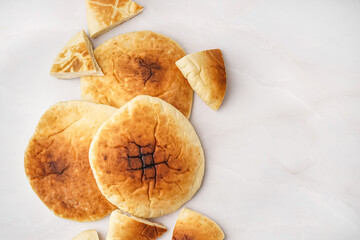 Tasty pita bread on white background - Powered by Adobe
