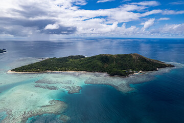 Aerial view above tropical coral reef on Island in Fiji in the Pacific Ocean
