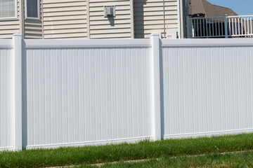 white plastic fence for backyard protection and privacy
