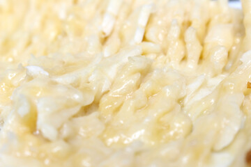 crushed banana. crushed yellow fruit. banana details.