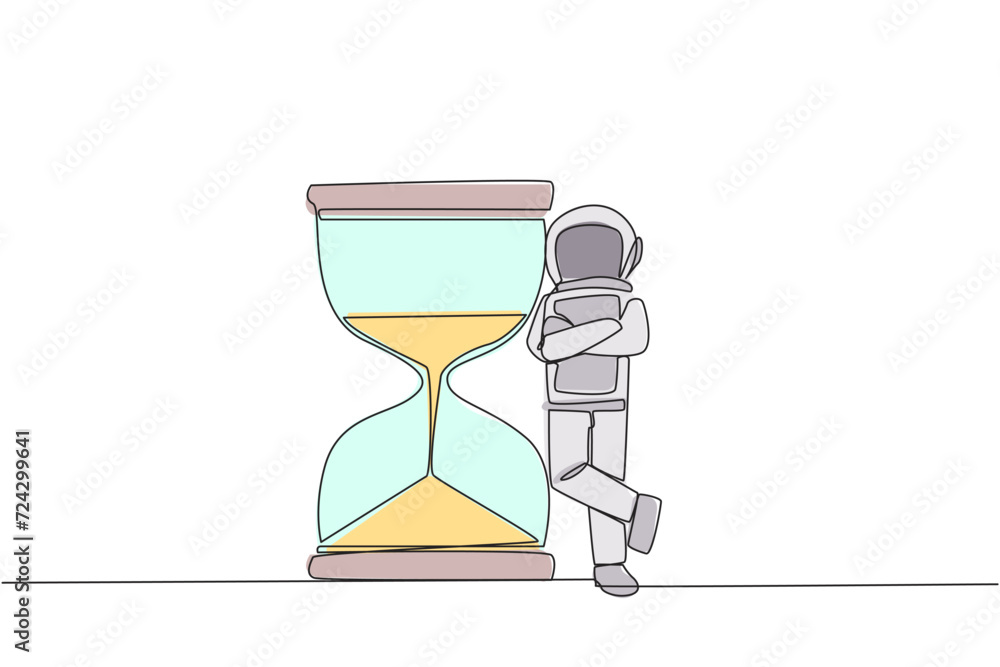 Poster continuous one line drawing young energetic astronaut lean on giant hourglass. counting the waiting 