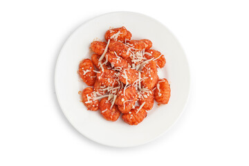 Plate of tasty gnocchi with cheese on white background