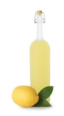 Bottle of tasty limoncello liqueur, lemon and green leaves isolated on white