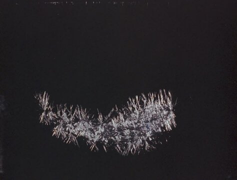 Timelapse of frost pattern forming on glass, against black. Resolution: 2048 x 1556 at 24fps