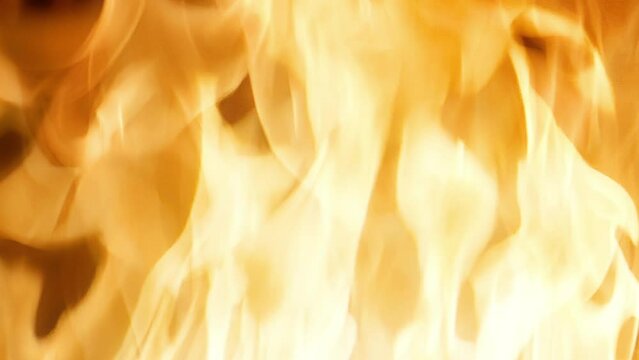 A 4K slow-motion closeup fire VFX insert element. It has a slow-motion inferno firewall looped, and the fire is quickly captured. It is ideal for visual effects and motion graphics.