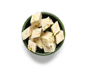 Bowl with tasty Eastern sweets for Ramadan on white background