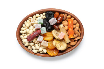 Plate with traditional Eastern sweets and nuts for Ramadan on white background