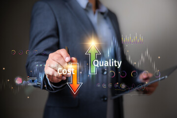 Cost and quality control, business strategy and project management concept. Businessman drawing a sign of cost reduce and profit up on virtual display